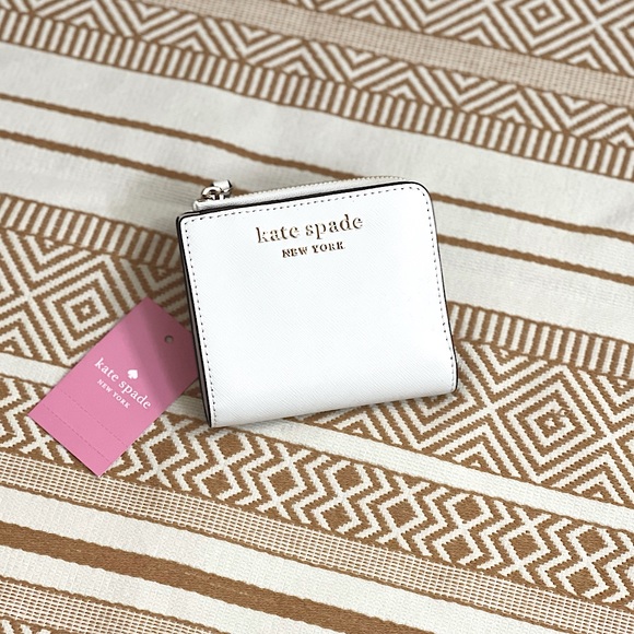kate spade Handbags - Kate Spade | Staci Zip Around Bi-Fold Wallet